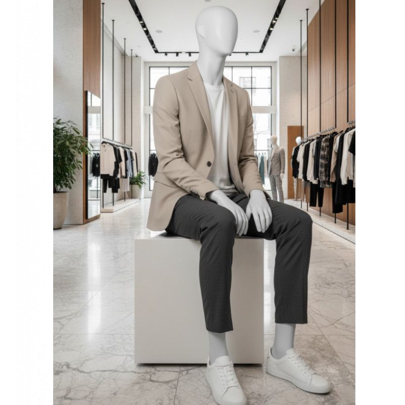 Image 2 : Light grey seated male model ...