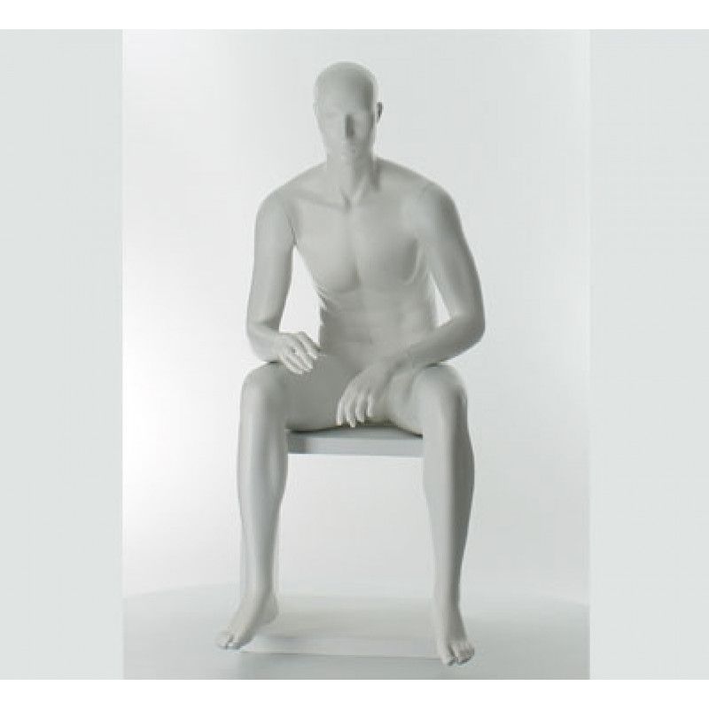 Maniqui hombre sentado con con cabeza blanca : Mannequins vitrine
