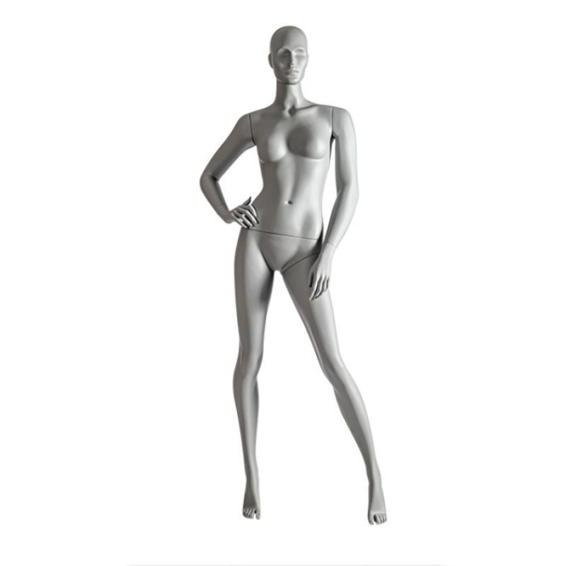 Straight female mannequin with pose and hands on hips : Mannequins vitrine