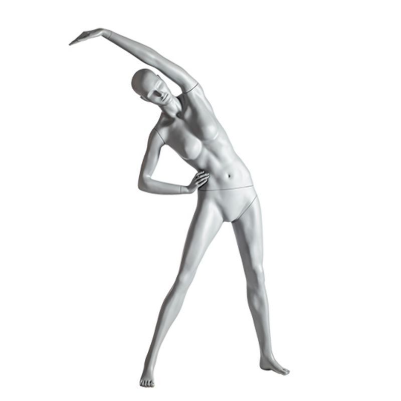 Weibliche Schaufensterpuppe, die Yoga ausdehnt : Mannequins vitrine