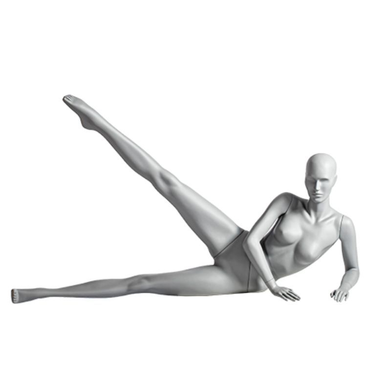 Weibliche Sportpuppe in dynamischer Position : Mannequins vitrine