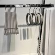 Image 1 : 5 round grey wooden hangers ...