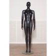 Image 0 : Female mannequin in black standing ...