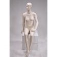 Image 0 : Woman window mannequin sitting with ...