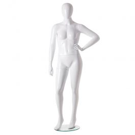 Strong woman window mannequin with hand on hip and abstract ... Plus size mannequins Plus size white glossy mannequin size 44 Mannequins vitrine